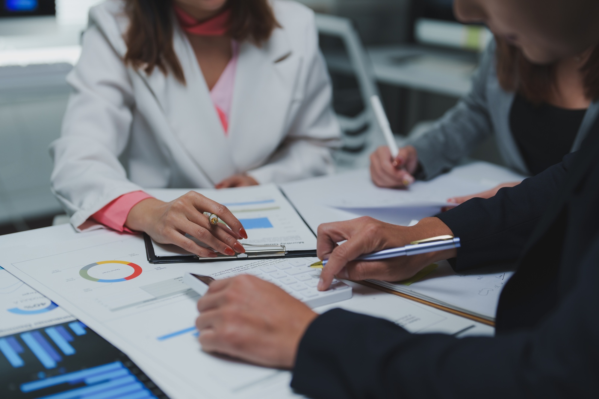 Business people calculating tax and auditing business consulting meeting